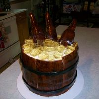 Beer Barrel Cake When I saw this cake I had to give it a try. The birthday girl loved it. I was surprised at how easy the bottles were to make.