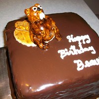 Beaver Banana cake, caramel icing, and covered in chocolate ganache. Beaver made from MMF.
