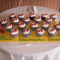 Wizard Of Oz Cupcakes Yellow brick road and ruby slippers are all made out of chocolate. Red velvet cupcakes w/ buttercream frosting, blue gingham cupcake liners...