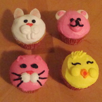 Animal Cupcakes I copied these designs from the Wilton site: bunny, teddy bear, cat and chick