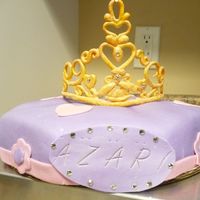 Princess Azari This is my version of the pillow cake. Its is an octagon shape with a button in the middle topped with a gumpaste tiara. This is my 1st...