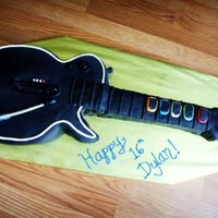 Guitar Hero Cake Chocolate and Vanilla cake with oreo buttercream filling. all fondant decorations. TFL!
