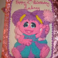 Abby Cadabby Cake From Sesame Street A friend baked this Abby Cadabby cake for my daughter's 2nd birthday. She used the Wilton pan.