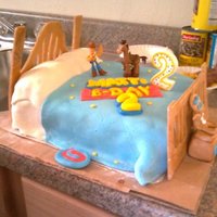 Toy Story Cake toy story cake I made for my nephew, all fondant, except for 50/50 gumpaste headboards, but I should've used whole gumpaste b/c it was...