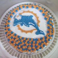 Miami Dolphin Birthday Cake ok, this was actually my VERY first cake I made. its just a basic cake with buttercream icing.