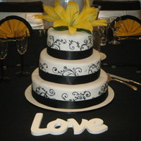 Oriental Lilly Wedding Cake My very first wedding cake which I had to construct at the venue. My customer was over the moon with this and so was I. I really suprised...