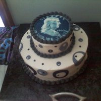 Half Dollar 50Th Birthday 50th Birthday cake, 10 inch double layer with 6 inch double layer on top. Edible image of coin.