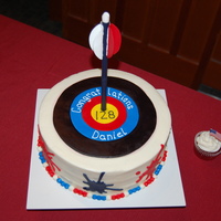 Archery Cake For an Eagle Court of Honor reception. The eagle scout loves archery and graphic design. The ink splats on the side of the cake match his...