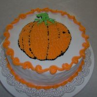 Fall Pumpkin Cake This was for a farmer's market that I attended with cookies to sell. It is a two-layer w/pudding in the middle. Iced in buttercream