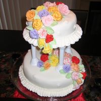 Cake_Pics_136.jpg My final Wilton cake, two tier fondant with fondant flowers