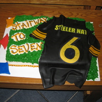 Steeler Opening Game Cake I made this for our Steeler Nation group in honor of the opening to the NFL season. Had a good time making my first shirt out of fondant....