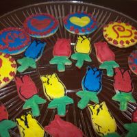 Stenciled And Shaped Cookies The stenciled cookies I was just trying to practice my stenciling and the flower shaped cookies were supposed to be a bouquet and they fell...