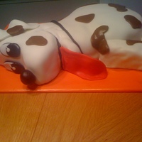 Dog Cake I loved this cake. The tongue might have been a bit long but it was cute. We made a bone for the one year olds smash cake