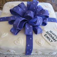 Present Cake MMF was used to cover the cake and for the decorations.