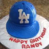 Hat Cake This was made for an old boss of mine. The cake was covered in MMF and even though I think it came out cute I realized some things I should...