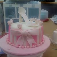 Girlie And Pink WASC covered in fondant with fondant stripes and gumpaste accents. It was my final cake for the Wilton's fondant and gumpaste class....