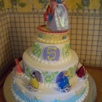 Disney Princess Cake This cake was for my daughter's 5th birthday. Not exactly how I pictured it coming out, but I was happy with it nonetheless.