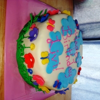 Livi's Garden Cake Made for a friend for her daughter's 2nd birthday; all she told me was "Do whatever you want, she's a girly-girl."