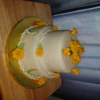 30Th Anniversary This cakes was a modernized replica of the original wedding cake... my first tiered cake and first gumpaste roses!