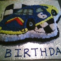 Race Car I made this car cake for a friend who was turning 6. I also made a couple Lightning McQueen cakes to go with it.
