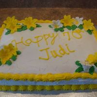 70Th Birthday Buttercream slab cake done with yellow and white lilies. Does anyone have any suggestions on how to make the look of my icing smoother? I&#...