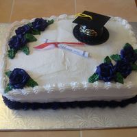 Graduation Graduation cake - school colour is dark purple. Vanilla cake with a raspberry filling.