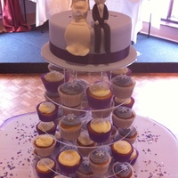 Cupcake Tower Full cupcake tower with personalised people on cutting cake