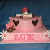 Cowgirl Party Buttercream icing with fondant accents. Boots & Pony made of fondant.