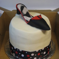 Black & Red Quick cake for my friends birthday. This was my first shoe! Made of fondant