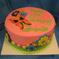 Butterfly Flower Cake Buttercream icing with fondant accents, & ribbon.