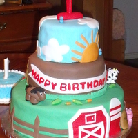 Animal Farm Birthday Cake 12, 8, and 6 inch tiers, covered in rolled fondant with fondant decorations for my friends son's first birthday.