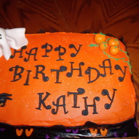 Halloween Birthday Cake 2 layer sheet cake with buttercream frosting and fondant accents.