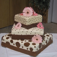 Polka Dot And Gerber Daisies Flowers are made out of gumpaste.