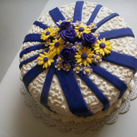 White, Yellow And Purple Flower Fondant Cake 