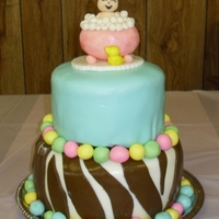 Bubble Bath Baby! Buttercake filled with milk chocolate ganache and iced with mock bettercreme, then covered in MMF. Baby and tub are made from modeling...