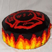 Fireman's Maltese Strawberry cake with chocolate buttercream. I made the Maltese on top to match his necklace. Since I am still a beginner, comments and...