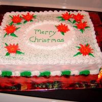Christmas Concert Cake royal icing pointsetas, buttercream for everything else.