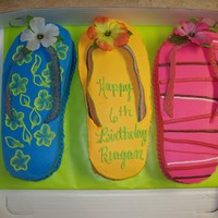 Flip Flops 3 cakes cut from a half sheet. All buttercream the straps are something called sour power they are strips that I found at a local party...
