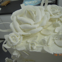 White Christmas 3 tier construction - dummy cake. Royal icing with fondant accents.