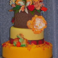 Thanksgiving dummy cake for class with Collete Peters. Gum paste flowers with fondant leaves.