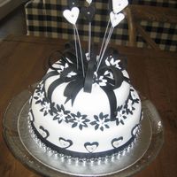 Black And White Birthday Cake I made this for a friend for her 70th Birthday. She had a bling party.