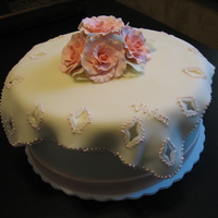 Handkerchief Cake 80th birthday cake. Carrot with cream cheese icing filling; iced in white chocolate ganache with white chocolate MFF.