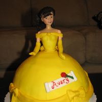 Belle Doll Cake Doll cake to look like Belle from Beauty and the Beast, strawberry swirl cake with strawberry filling, iced in white chocolate bc with MMF...
