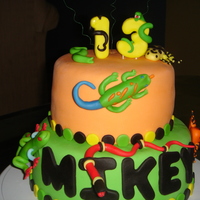 Amphibians For my son's 13th birthday, inspired by a cake by pink cake box, I added dart frogs which my son thought were awesome. TFL