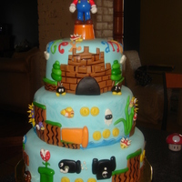 Super Mario Another Super Mario cake, this time for my friends twins b-day. Must say that this one came out much cuter,than the 1st, I guess everytime...
