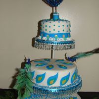 Abstract Peacock All I knew about the girl this cake was made for was that she has a lot of tattoos. Somehow, ribbons, bows and flowers just did not seem to...