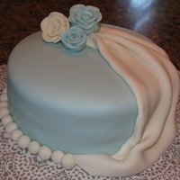 First Cake Using Fondant This was from the fondant and gumpaste wilton class, my first fondant cake.