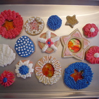 Christmas Cookies Buttered and Vanilla/Peppermint flavored cookies iced with vanilla butter meringue butter-cream. Also with colored sugar and dragees.