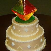 Diamond Cake This is a cake we just did for a company function. The sugar art on top is a three dimentional version of their company logo, or at least...