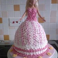 Barbie Cake This is the very first cake i ever made for my niece's 5th birthday. It was a labour of love as it took me 12 hours to make! She is...